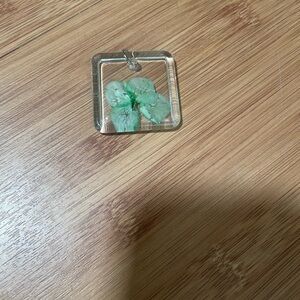 Clear Resin Pendant with Green Leaf